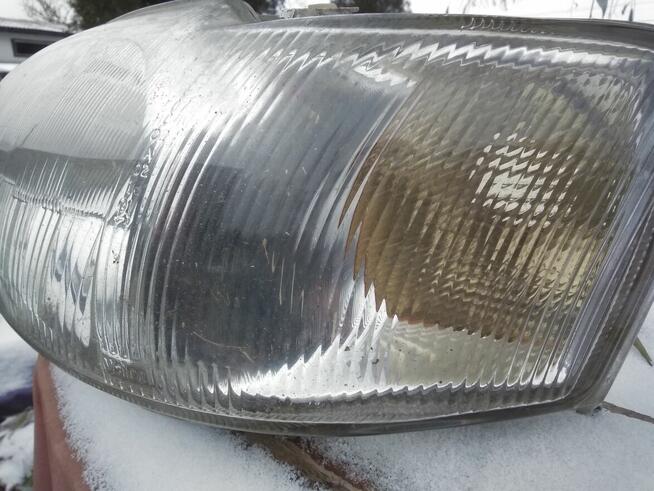 Lampa lewy przód Ford Escort MK VII