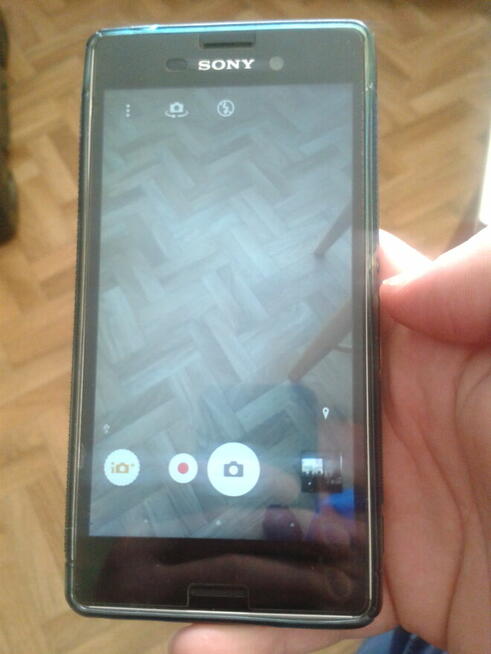 Sony smartfon-komplet.etui, karta startowa nowa, sluch.nowe