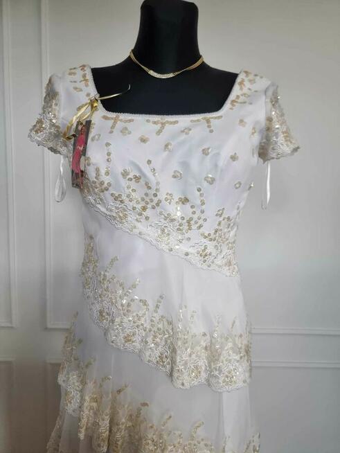 Tanio sukienkę z rękawem 38-40