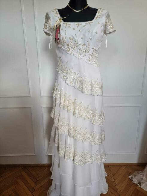 Tanio sukienkę z rękawem 38-40