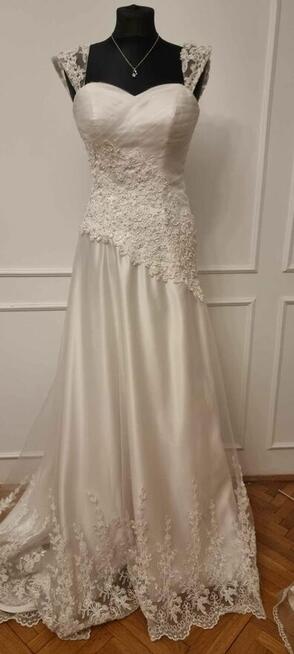 Sprzedam Tanio suknie ślubną rozmiar 36-40
