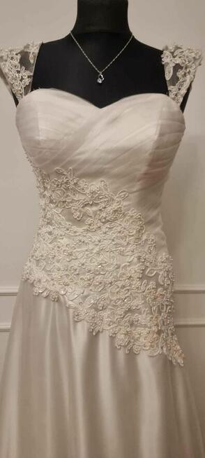 Sprzedam Tanio suknie ślubną rozmiar 36-40