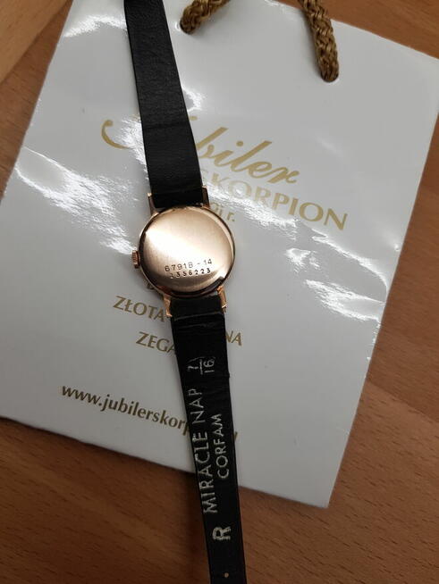 Zegarek damski *Doxa* z 14-karatowego różowego złota pr.585