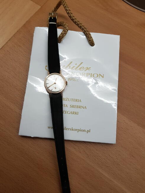 Zegarek damski *Doxa* z 14-karatowego różowego złota pr.585