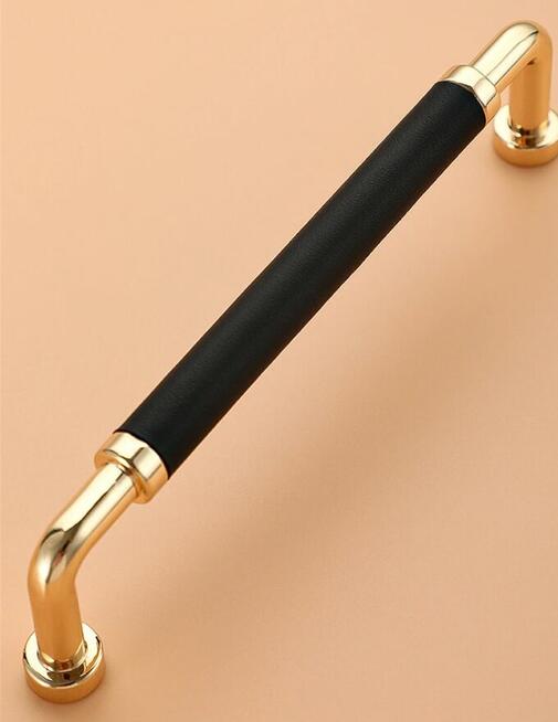 Nowoczesny uchwyt meblowy z serii LEONI złoty + czarny