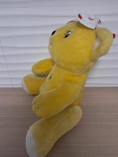 Zabawka pluszowa – miś żółty z opaską, do sprzedania