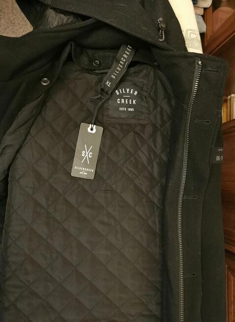 Piękna kurtka z kapturem na podpince Rozm XL NOWA z metką