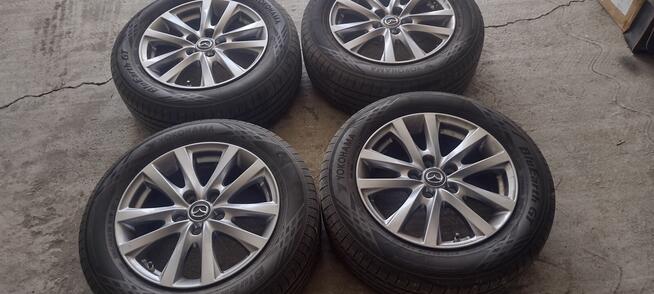 Sprzedam komplet kół aluminiowch do Mazdy