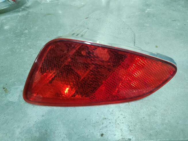 FORD FIESTA MK7 LAMPA PRZECIWMGIELNA TYLNA LEWA H1BB-15K273-