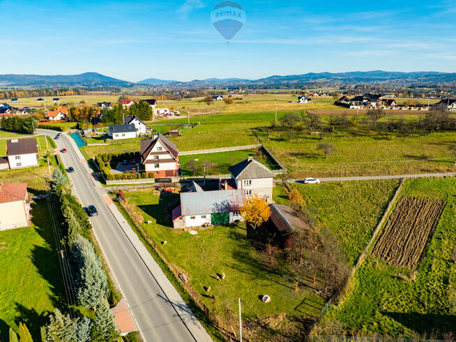 Działka budowlana z domem i budynkami gospodarczym