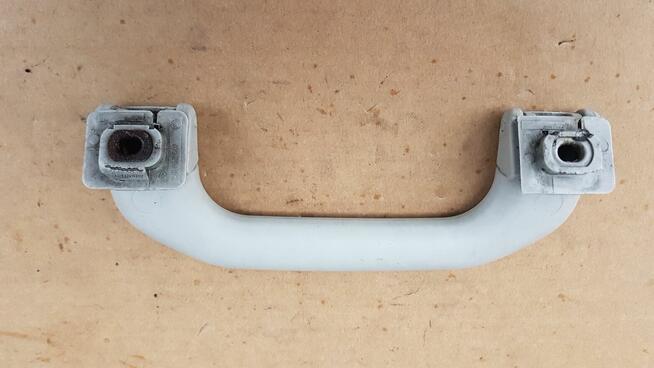 VW GOLF III UCHWYT RĄCZKA PODSUFITKI 1H0857607