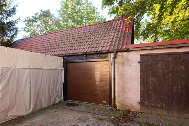 Przytulne mieszkanie z ogrodem, garażem i piwnicą