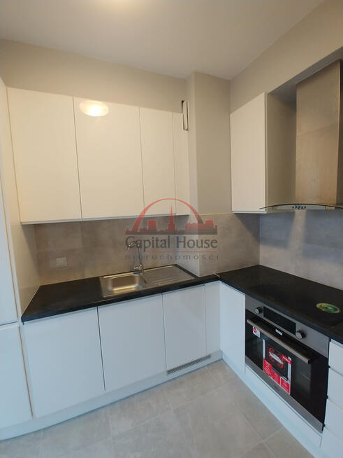 Kawalerka z oddzielną kuchnią i garażem