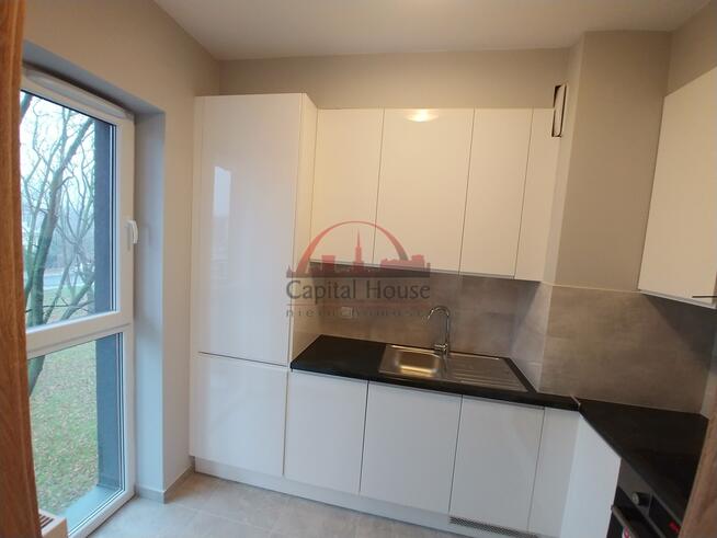 Kawalerka z oddzielną kuchnią i garażem