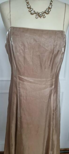 Sprzedam śłiczną złotą sukienkę rozmiar 42-44