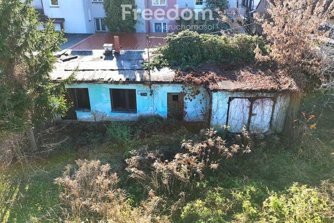 Działka inwestycyjna zabudowana budynkiem usługowy