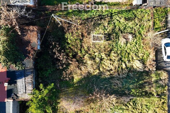 Działka inwestycyjna zabudowana budynkiem usługowy