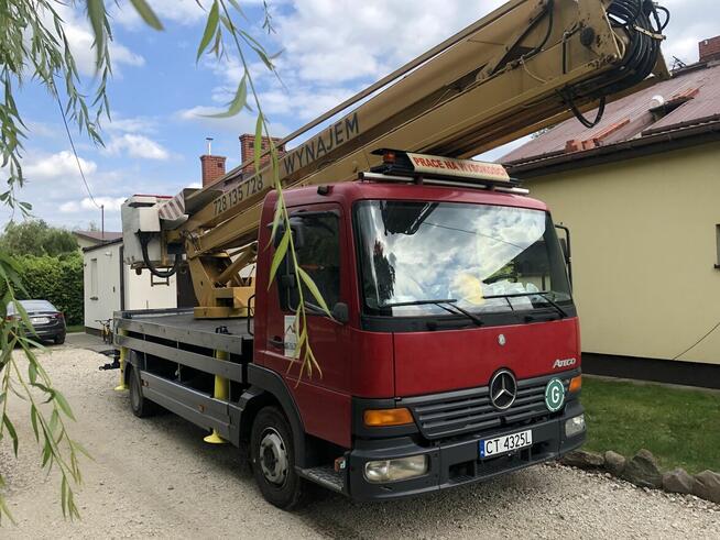 Wynajem podnośników zwyżki wycinka drzew mycie elewacji