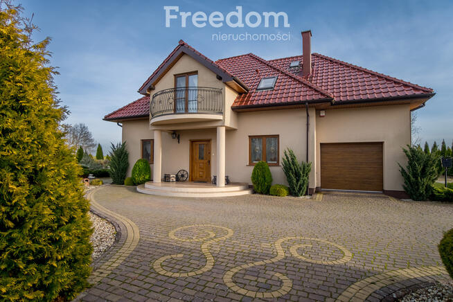 Piękny dom z ogrodem i widokiem na jezioro