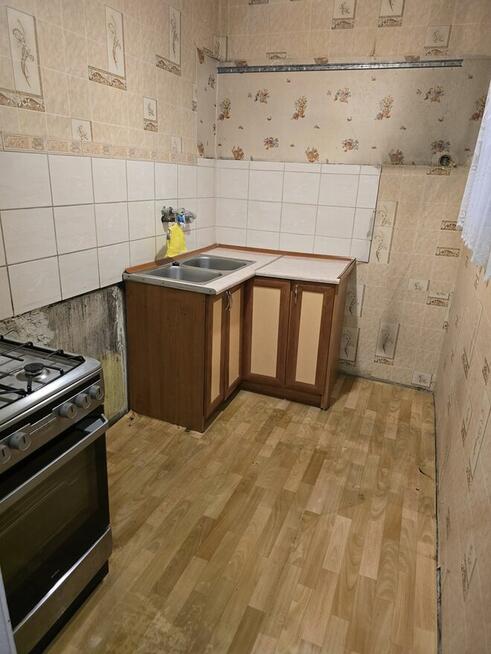 2 pokoje z balkonem w bloku w Grodźcu