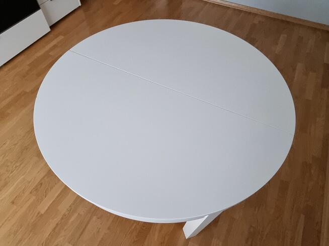 Biały okrągły stół IKEA BJURSTA 115cm rozkładany do 166cm