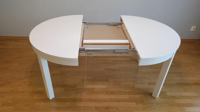 Biały okrągły stół IKEA BJURSTA 115cm rozkładany do 166cm