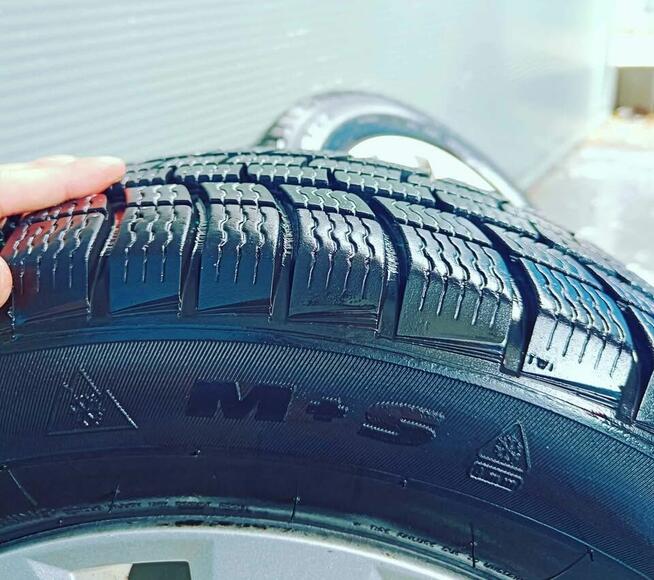 Felgi aluminiowe 15” + opony zimowe Opel 4x100 – komplet