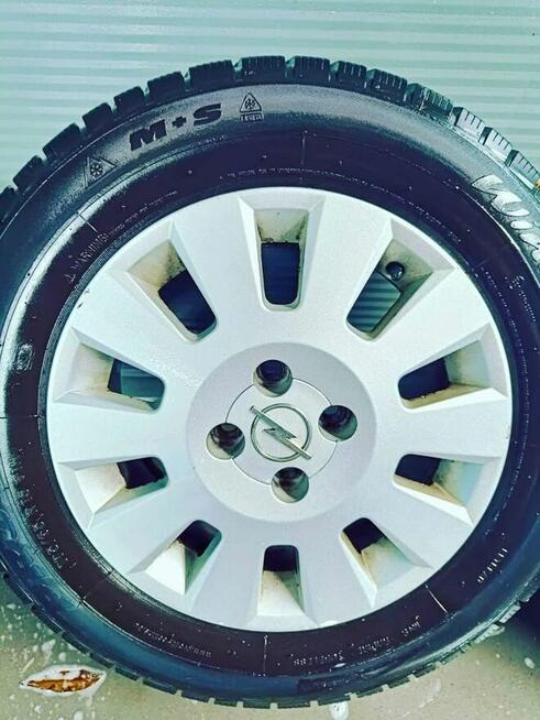 Felgi aluminiowe 15” + opony zimowe Opel 4x100 – komplet