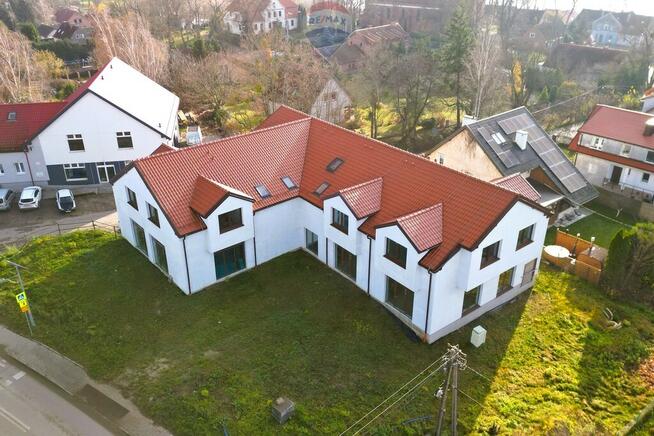 Budynek usługowy z pięcioma mieszkaniami