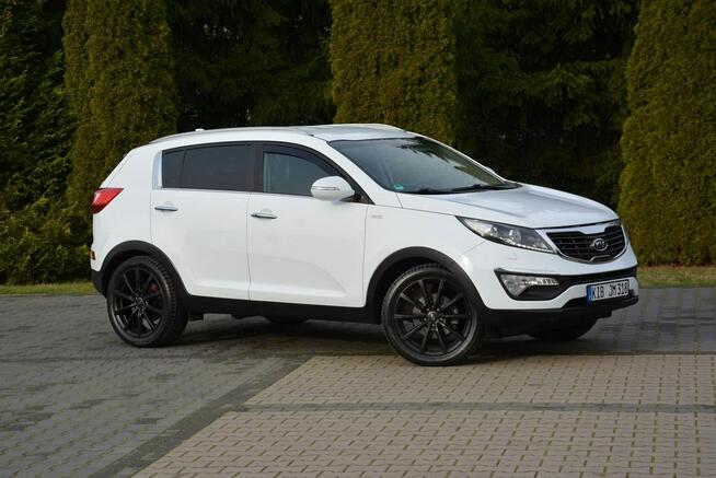 Kia Sportage Automat AWD Xenon Ledy Navi Parktronic Kamera Skóry Alu19"