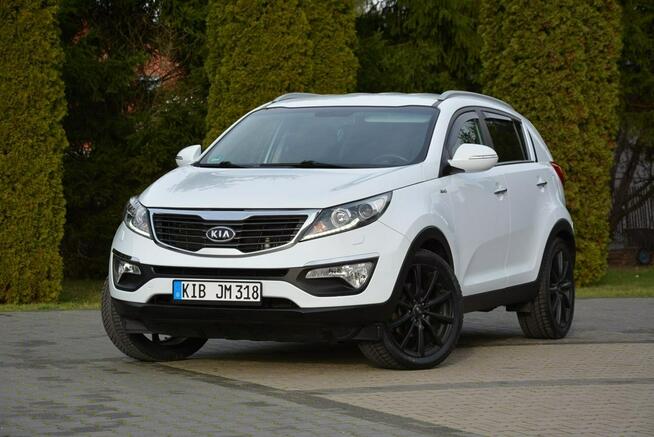 Kia Sportage Automat AWD Xenon Ledy Navi Parktronic Kamera Skóry Alu19"