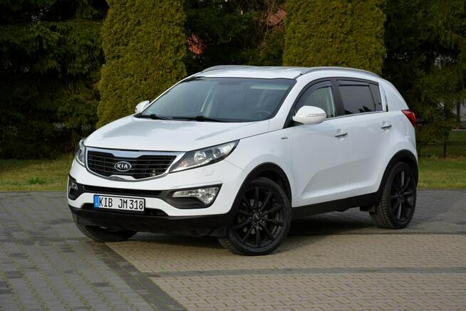 Kia Sportage Automat AWD Xenon Ledy Navi Parktronic Kamera Skóry Alu19"