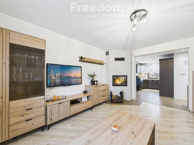 Mieszkanie z ogrodem, garażem i kominkiem