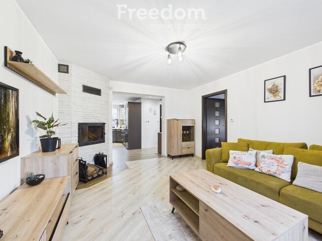 Mieszkanie z ogrodem, garażem i kominkiem