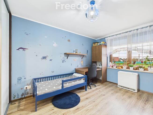 Mieszkanie z ogrodem, garażem i kominkiem