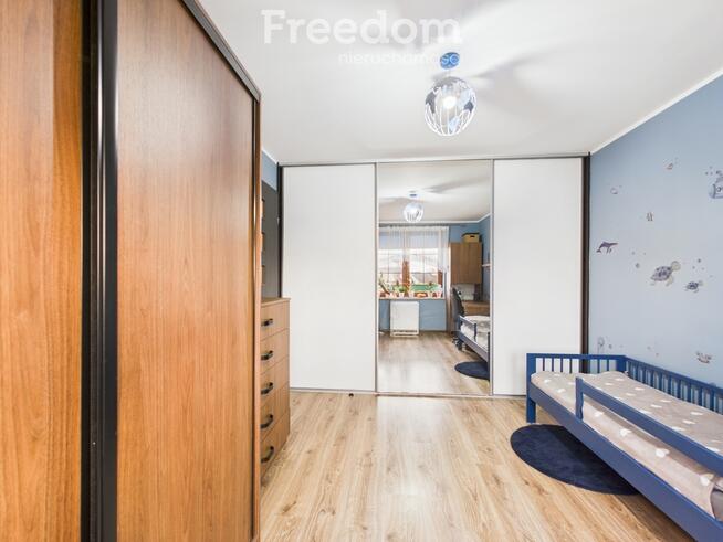 Mieszkanie z ogrodem, garażem i kominkiem