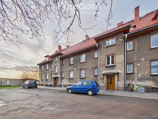 Mieszkanie z ogrodem, garażem i kominkiem