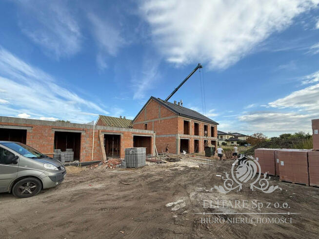 Dom w zab. bliźniaczej o pow. uż.105,27 z garażem+16,10m2/Iwiny