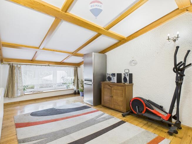 Dom szeregowy z ogrodem zimowym i dużą działką