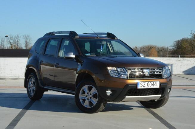 Dacia Duster 1.6i 105 KM Klima/ Navi/ Alu/ Ele. szyby/ Relingi/ Krajowy