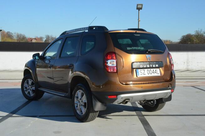 Dacia Duster 1.6i 105 KM Klima/ Navi/ Alu/ Ele. szyby/ Relingi/ Krajowy