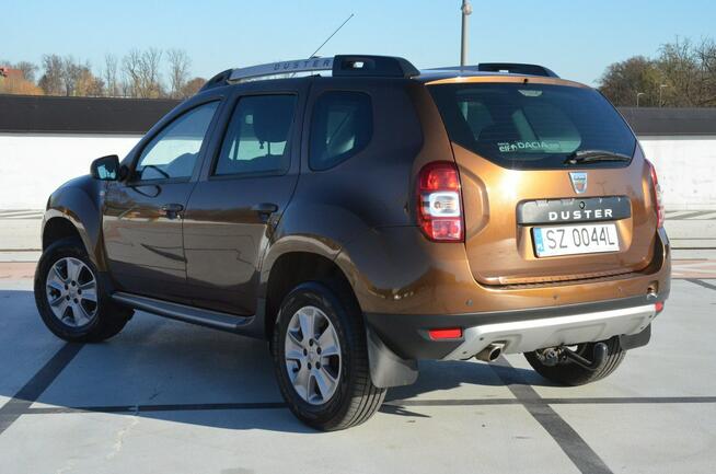 Dacia Duster 1.6i 105 KM Klima/ Navi/ Alu/ Ele. szyby/ Relingi/ Krajowy