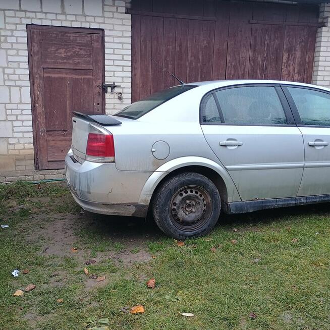 Opel Vectra C lampy przednie tylne.