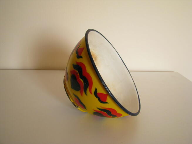 Piękna, stara, metalowa, emaliowana na żółto miska we wzory