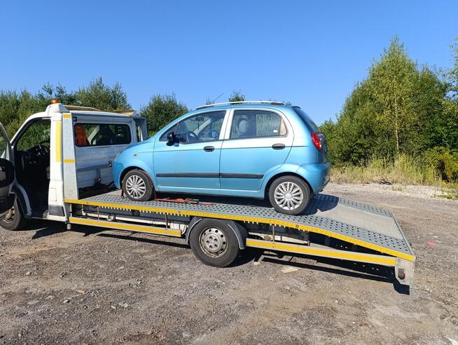 Pomoc Drogowa Leszno tania laweta od 100 zł 24/7 Rydzyna,