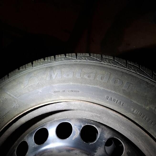 Opony zimowe z felgami stalowymi +kołpaki 195 65 15 Astra k