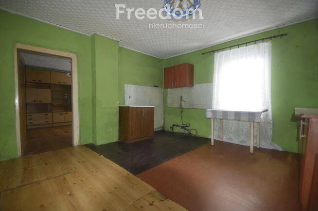 Dom do remontu z bud. gospodarczymi o pow. 9758 m2