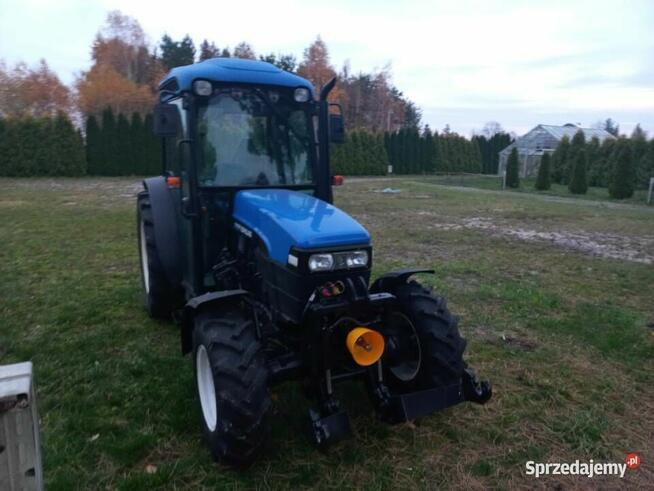 New Holland TN75 ,2002 r ,TUZ VOM do zamiatania odśnieżania