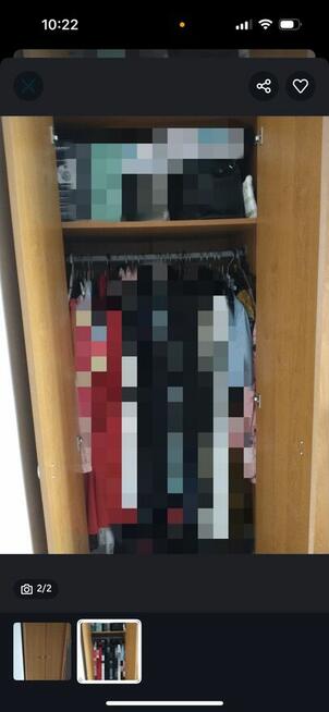 Zamykana szafa z drążkiem i półką