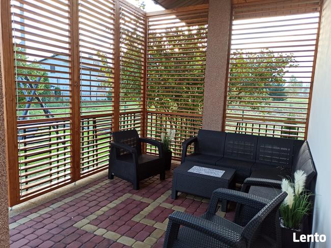 Drewniane shuttersy żaluzje balkonowe tarasowe ruchome